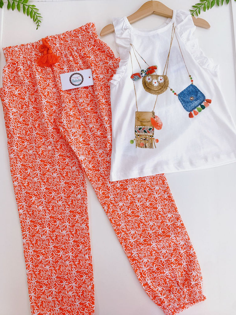 Pantalón naranja con blusa blanca estampado bolsas (9 años)