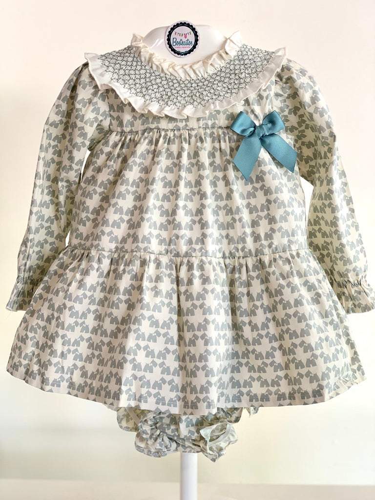 Vestido estampado perritos verde aqua opaco con borrado en cuello (5 años)