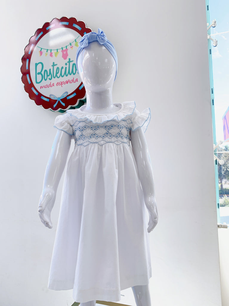 Vestido blanco bordado azul bebé