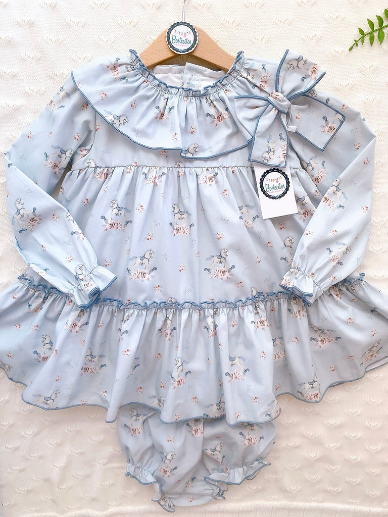 Vestido azul bebé estampado caballitos de carrusel