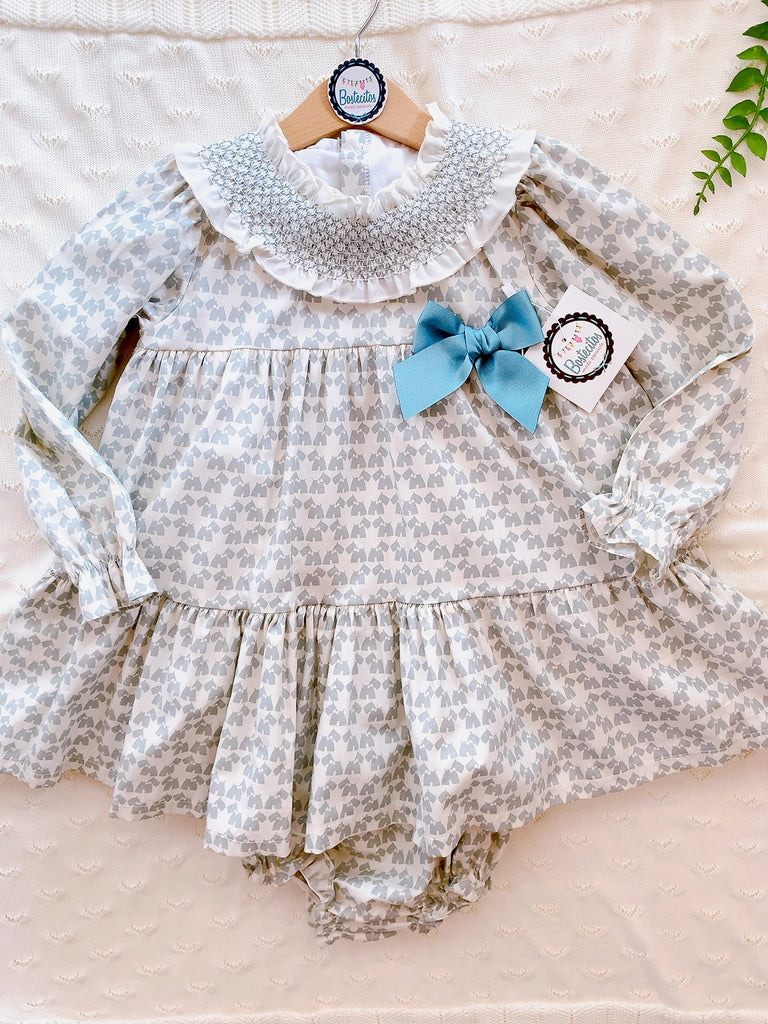 Vestido estampado perritos verde aqua opaco con borrado en cuello (5 años)