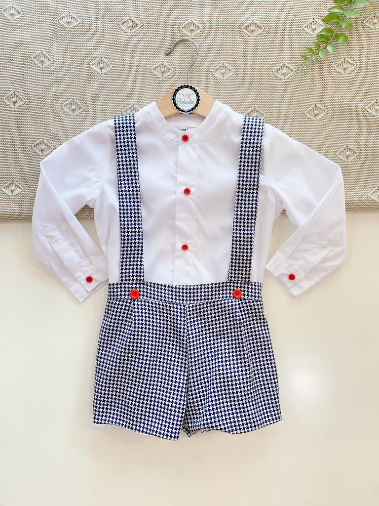 Conjunto blanco con negro con camisa manga larga blanca con botones rojos