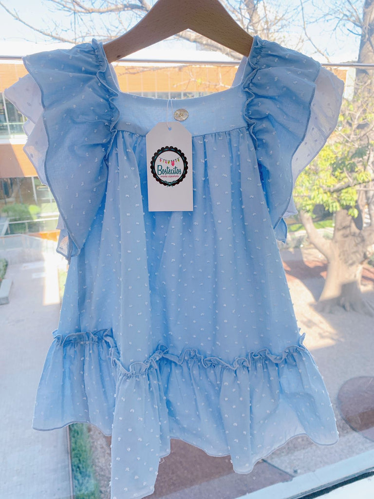 Vestido azul bebé plumeti con moño atras blanco