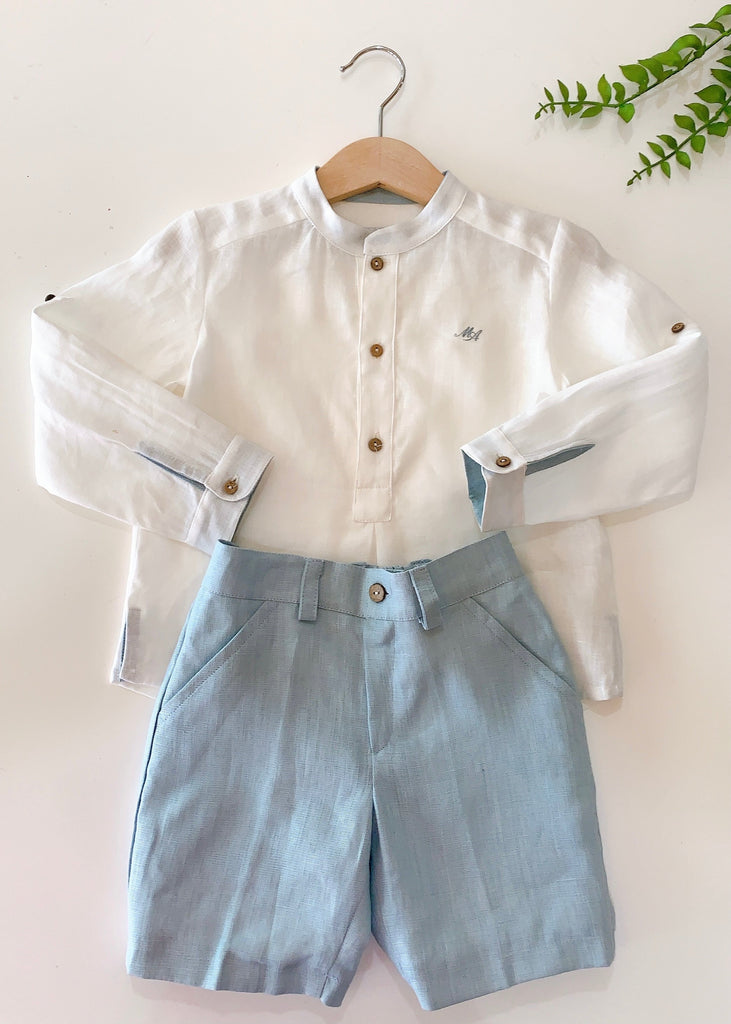 Conjunto shorts azul empolvado y camisa blanca (6 años)