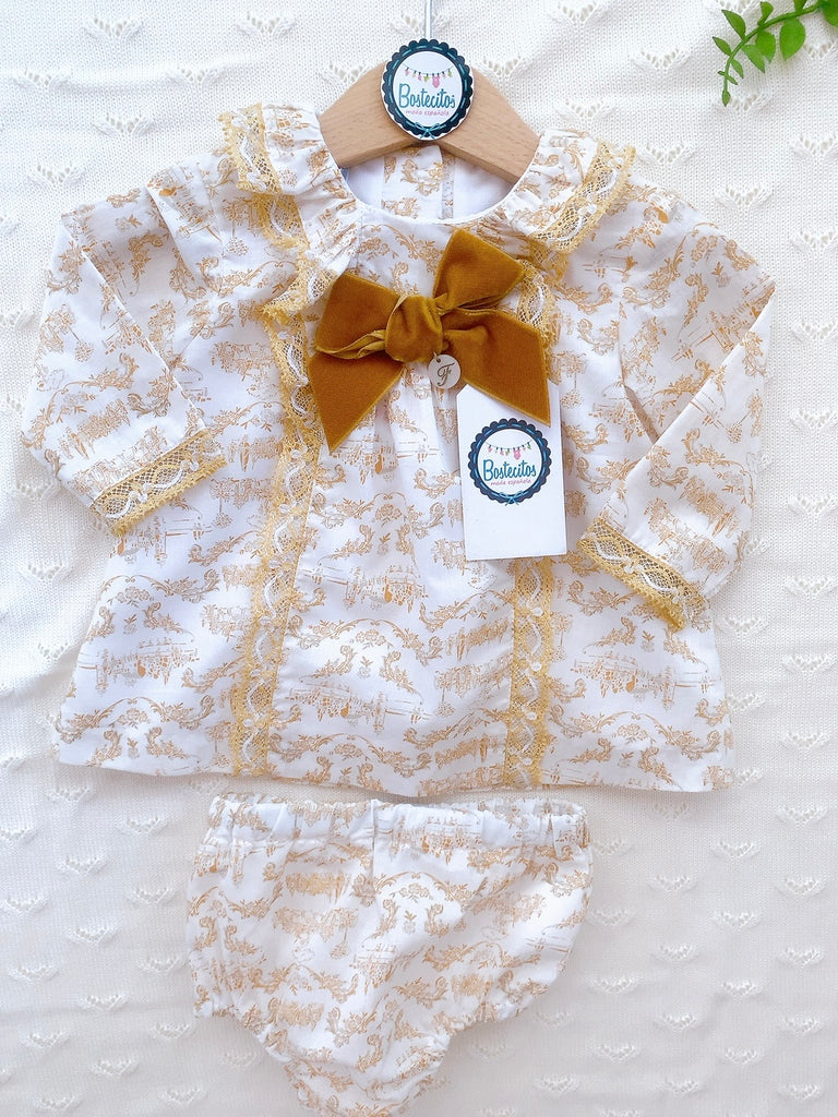 VESTIDO BLANCO CON DORADO MOÑO VELVET (6 MESES)
