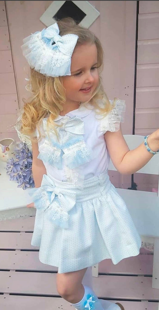CONJUNTO CAMISA BLANCA FALDA AZUL LAZO (8 años)