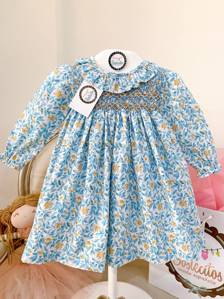 Vestido azul manga larga con flores cafés bordado a mano