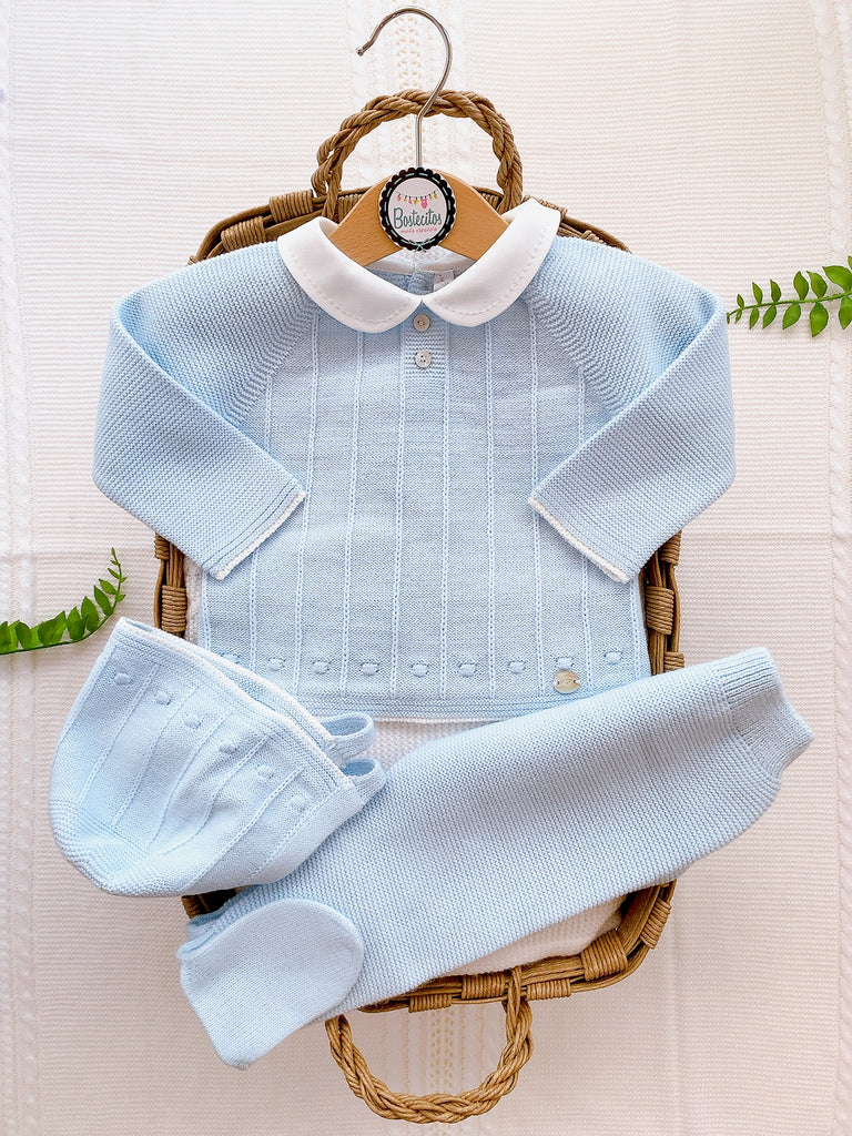 Tejido azul bebé cuello blanco líneas paralelas y dos botones (12 meses)