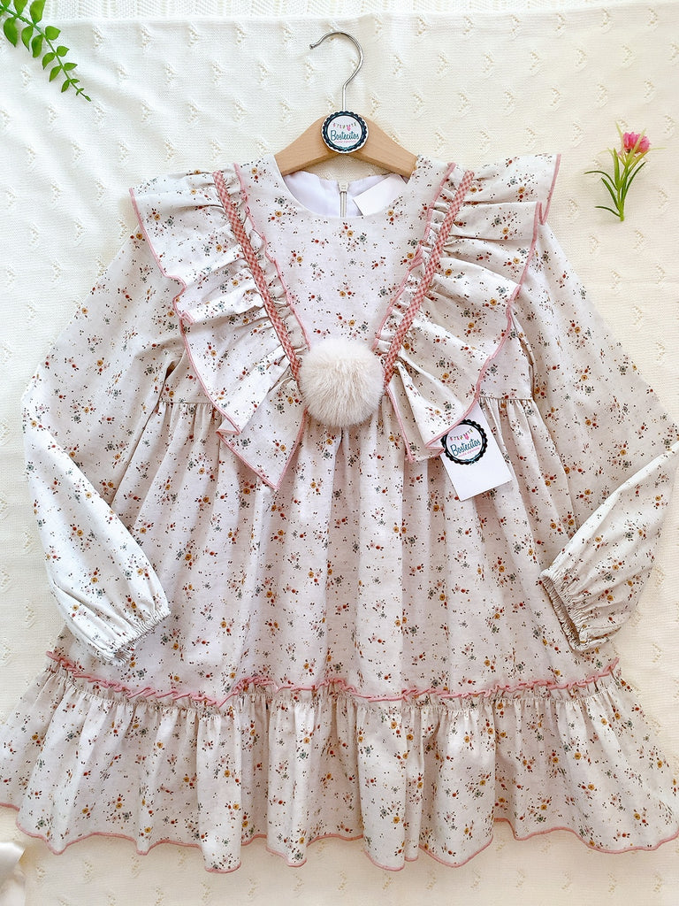 Vestido beige con pompón costuras rosas (7 años)