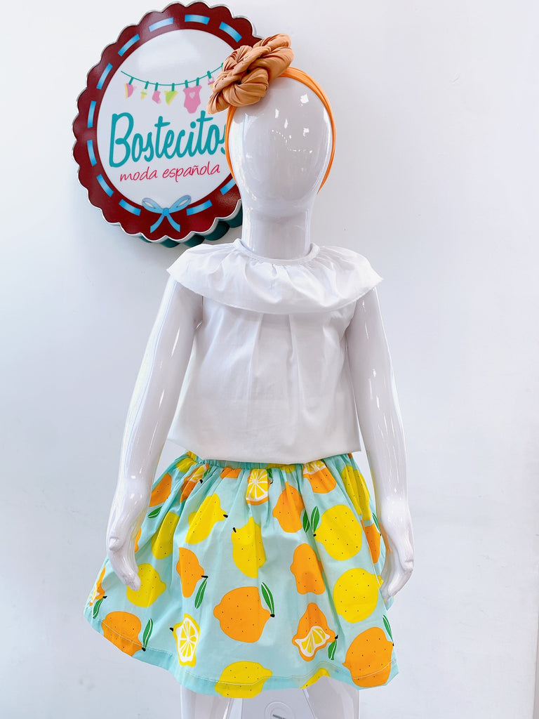 Conjunto falda limones y blusa blanca (10 años)