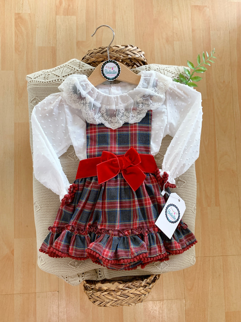Pichi cuadrado con moño rojo y blusa blanca
