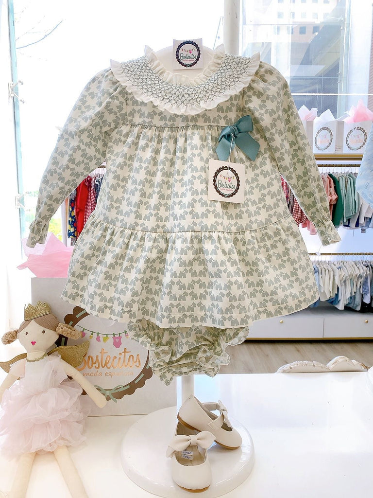 Vestido estampado perritos verde aqua opaco con borrado en cuello (5 años)