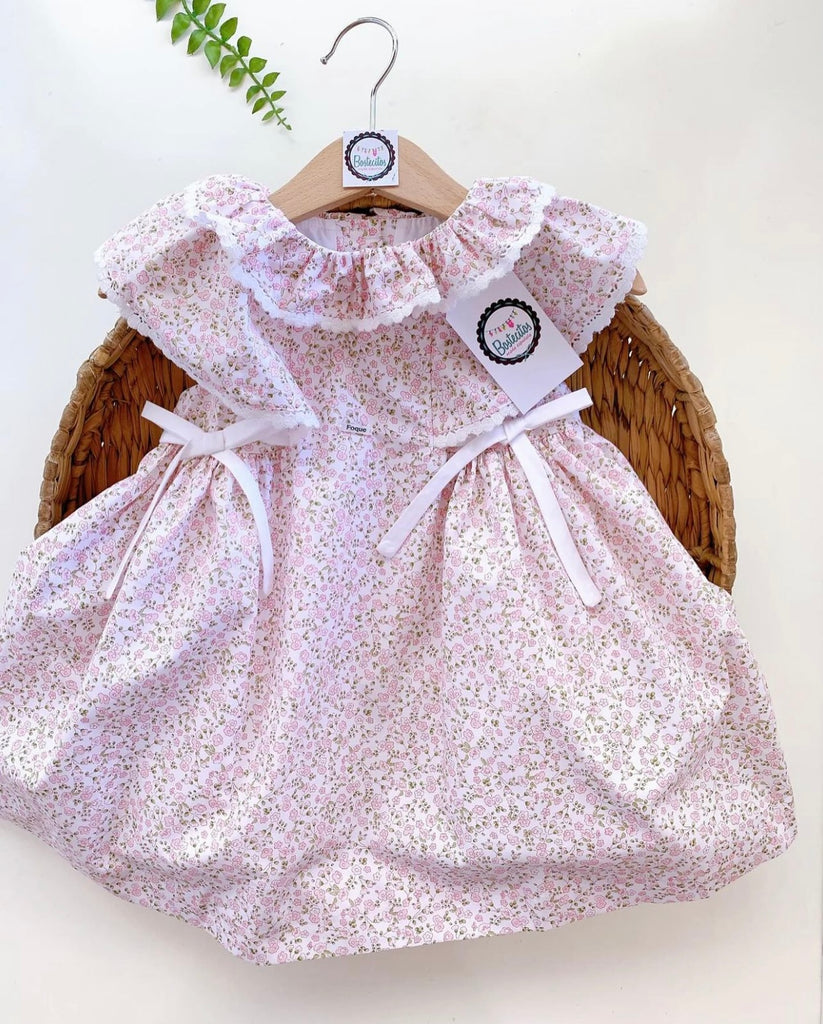 Vestido rosa flores con moños blancos (5 años)