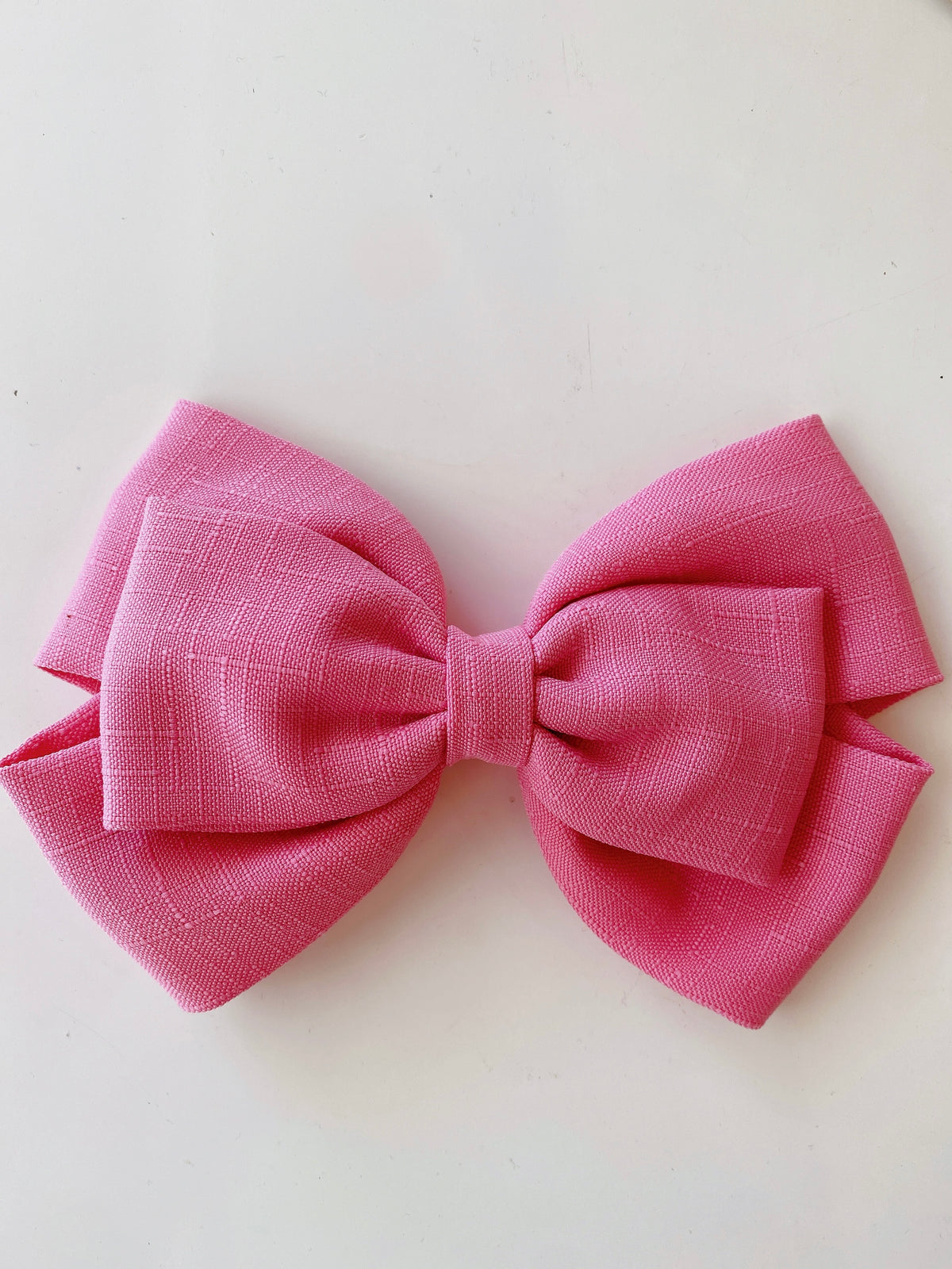 Moño grande rosa de tela Bostecitos