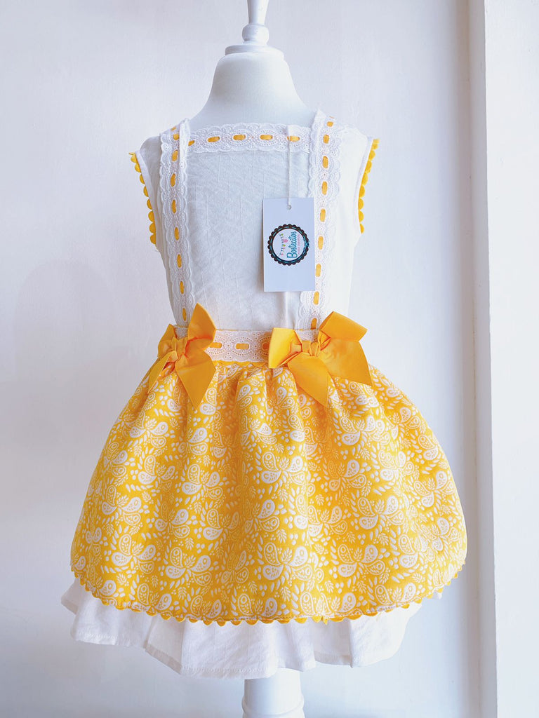 Conjunto falda amarilla con blusa blanca (5 años)