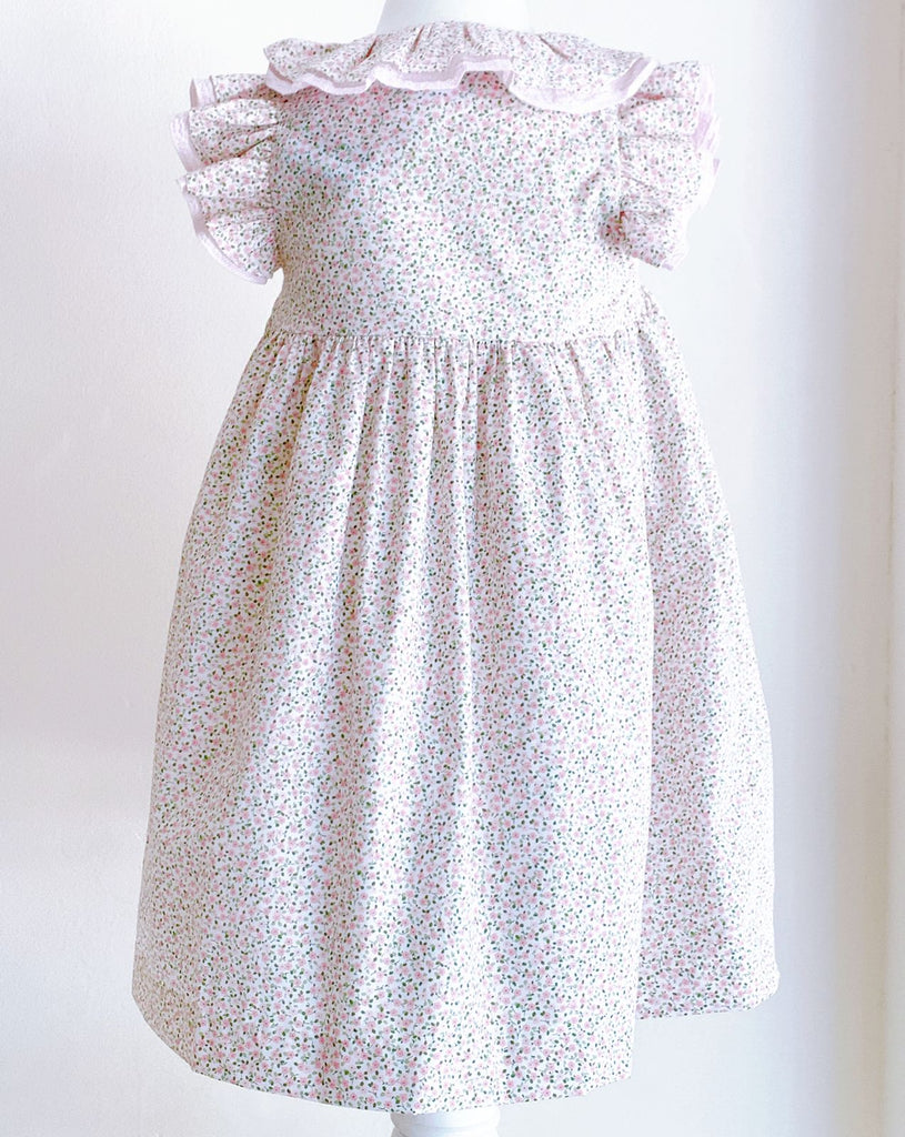 Vestido florecitas rosas con cuello de Olán botones